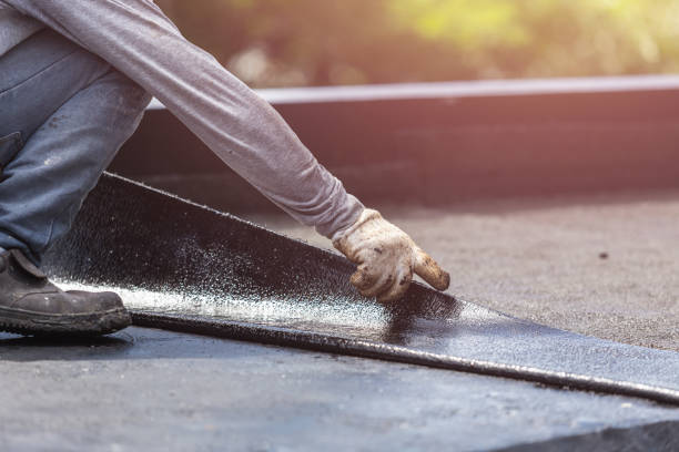 Professional Basement Waterproofing technician working in Old Fort, TN